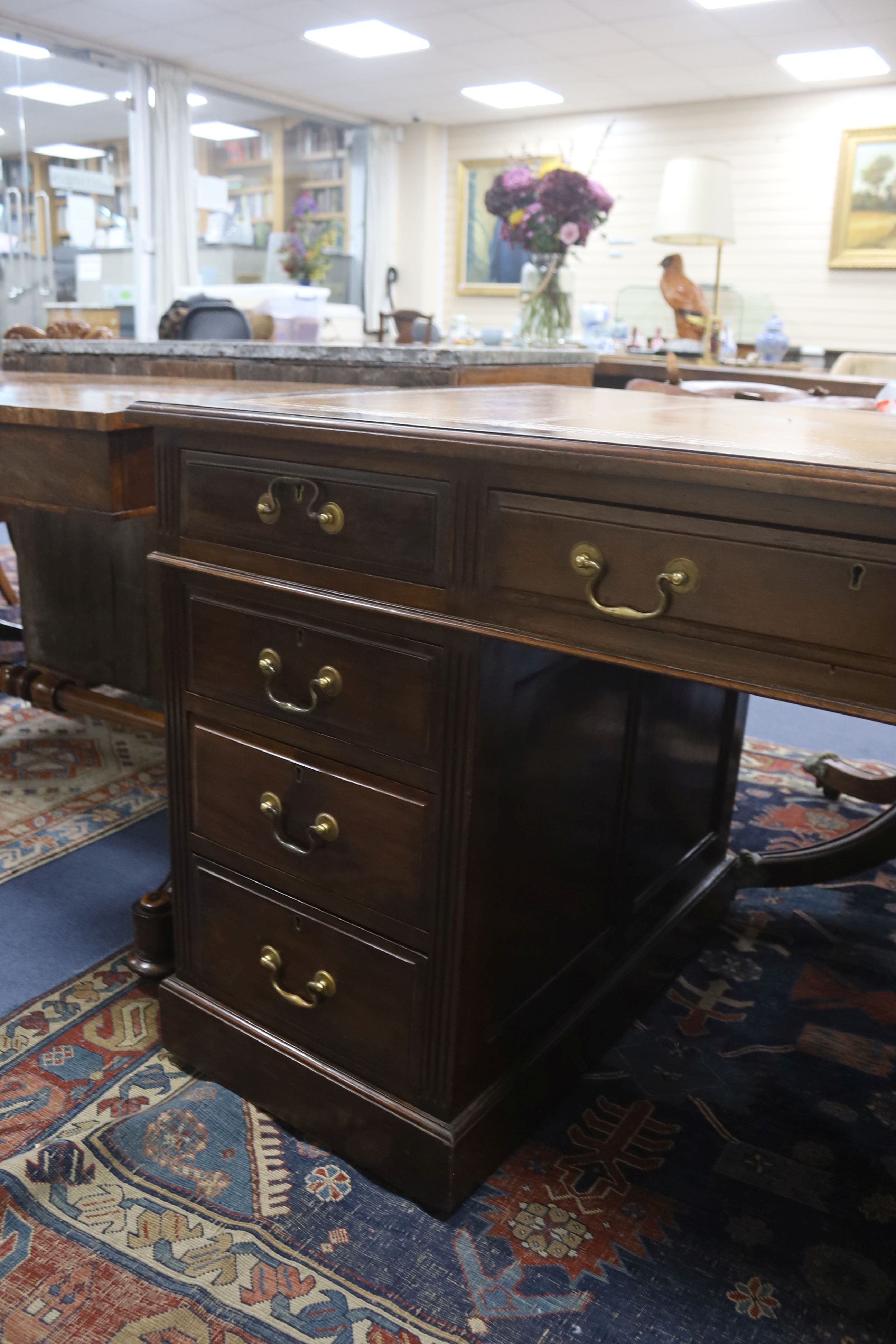 A late Victorian mahogany pedestal desk, length 138cm, depth 76cm, height 76cm